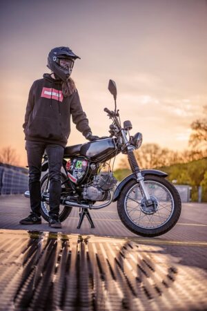 Lower Speed Limits for Mopeds: Safety, Environment, & Market Impact