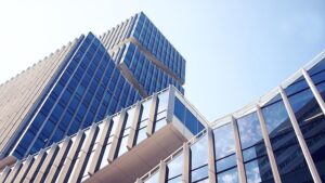 Navigating Commercial Re-Roofing: Hiring Contractors, Materials, and Maintenance